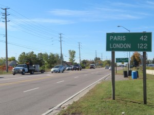 Sign with the distance to Paris and London Ontario