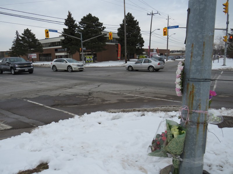 The intersection of Alness and Supertest, with a makeshift memorial on the southwest corner