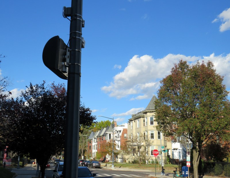 A pole-mounted camera faces an all-way stop in Washington DC