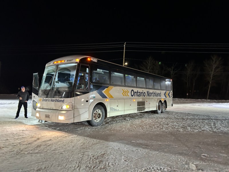 Ontario Northland coach bus in a snow-covered McDonald's in Fort Frances, Ontario