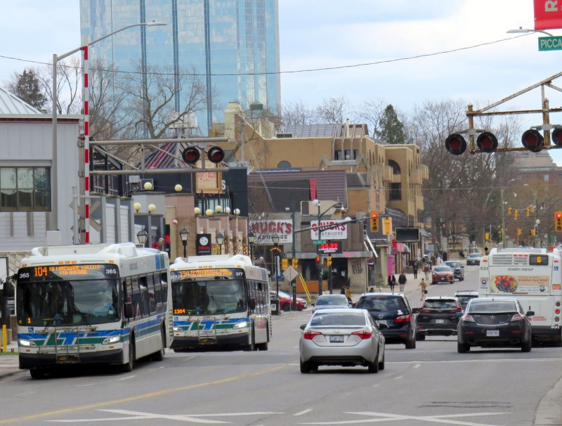 Several buses cross Richmond Street north of Downtown London